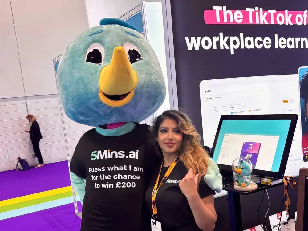 Ilham Ilyas and Hugo the Hummingbird on the 5Mins stand at the CIPD Festival of Work 2024